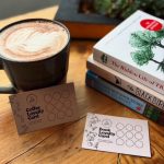 coffee and loyalty cards with books
