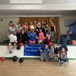 The danceathon group with the Cornwall Mind we did it banner!