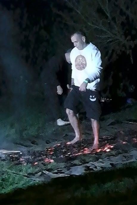 Mark doing his firewalk