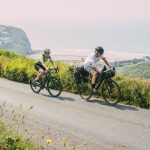 Two people cycling